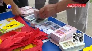 我市各銀行在市區(qū)集中開(kāi)展反假幣宣傳活動(dòng)