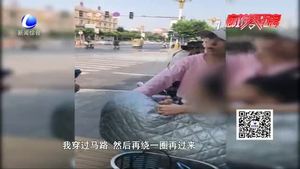 女子騎電動車帶孩子逆行 竟怒懟交警